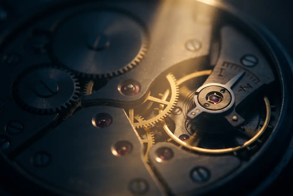 Precise brass gears in warm light