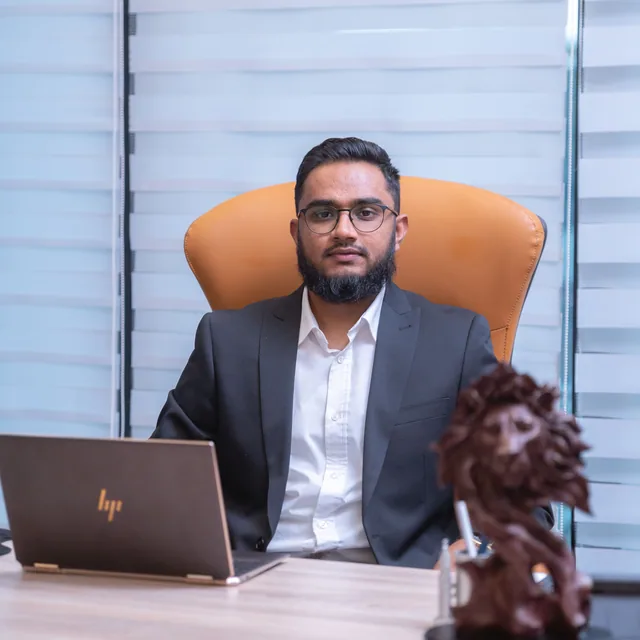 Mohsin Adamjee, Managing Partner, at his desk in the Nairobi office