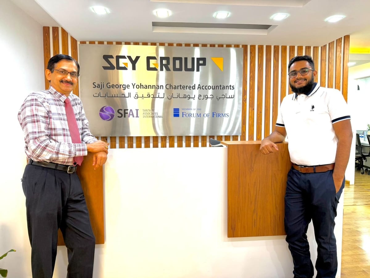 Mohsin Adamjee, Managing Partner of Adamjee Auditors, with Saji George Yohannan at SGY Group in Dubai